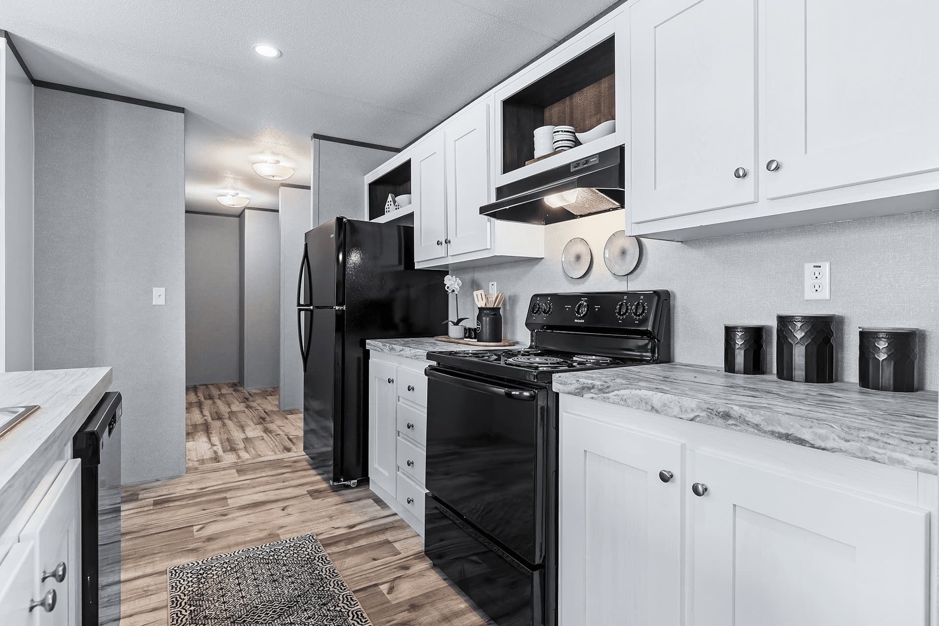 The cuatro 18x76 kitchen home features