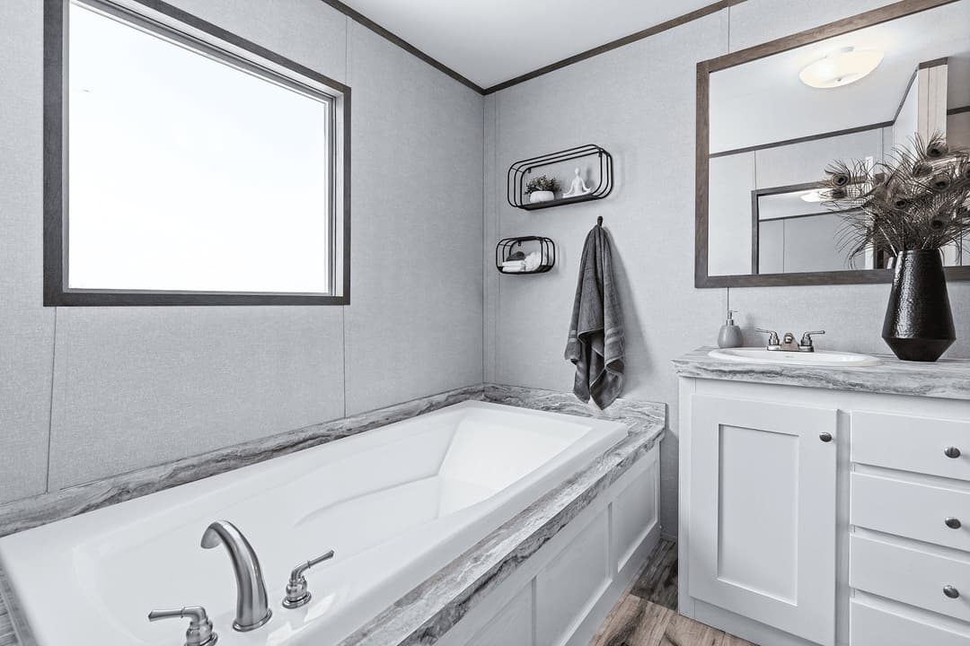 The cuatro 18x76 bathroom home features