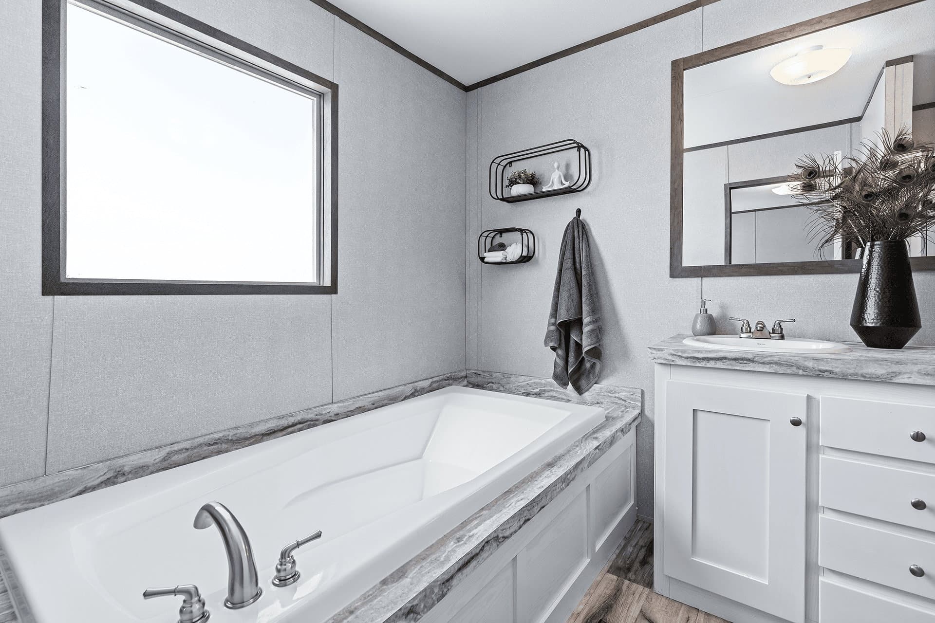 The cuatro 18x76 bathroom home features