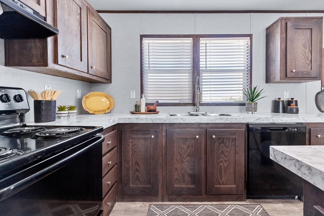 The nassau 28x48 kitchen home features