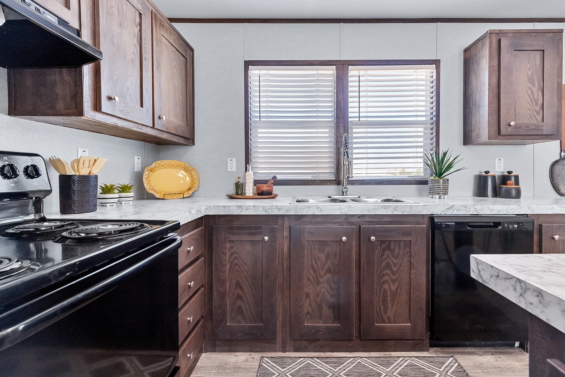 The nassau 28x48 kitchen home features