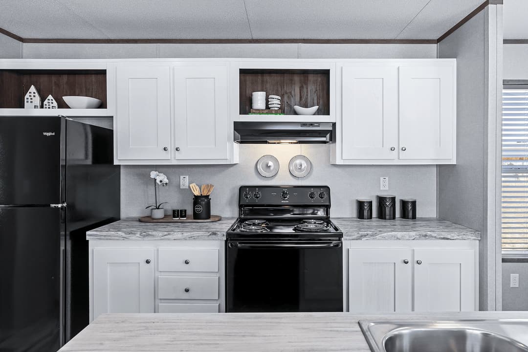 The cuatro 18x76 kitchen home features