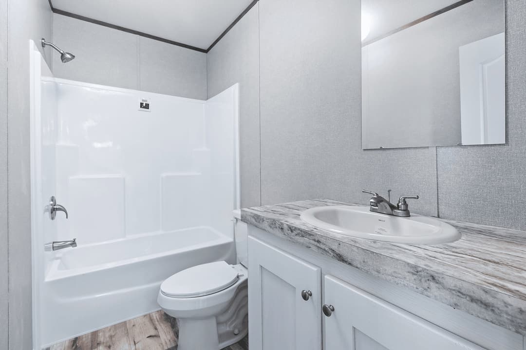 The cuatro 18x76 bathroom home features