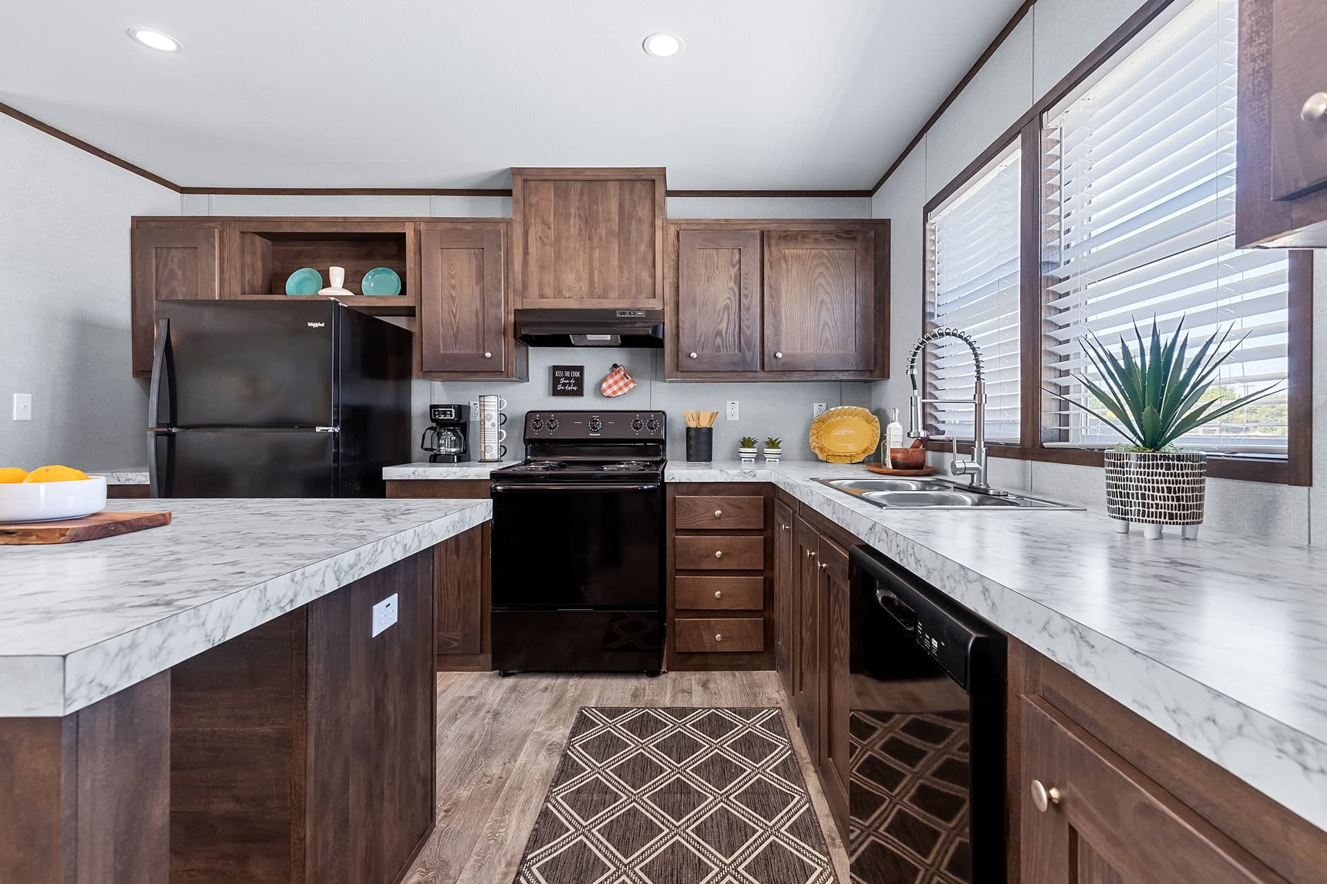 The nassau 28x48 kitchen home features